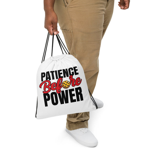 Patience Before Power Drawstring bag