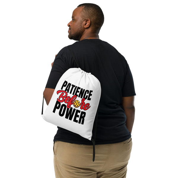 Patience Before Power Drawstring bag